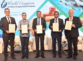 Global leaders with the ‘New Delhi Declaration’ during the 6th World Congress on Rural and Agricultural Finance